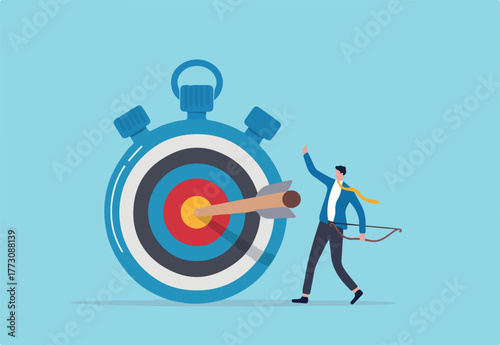 Time management to finish work within deadline, productivity or efficiency to reach goal, project timeline concept, smart businessman holding bow after shot at bullseye target on stopwatch.