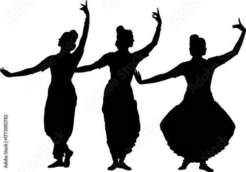 Silhouettes of three dancers performing traditional Indian classical dance.