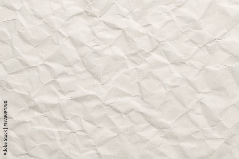 Obraz premium High resolution wrinkled white paper texture with soft creases and subtle shadows