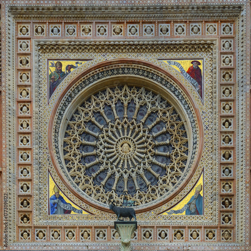 Orvieto Cathedral - rosette or rose window, a circular decorated window, typical of Gothic churches in Europe. 14th-century cathedral situated of Umbria, central Italy