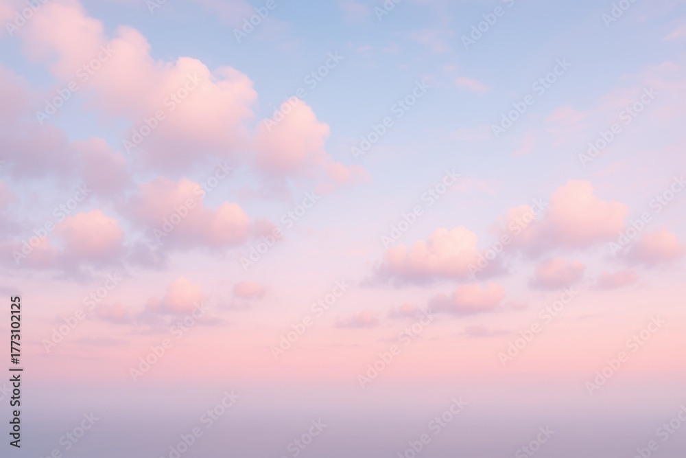 Obraz premium Dreamy sunrise sky with cotton candy clouds in pink and blue soft gradients