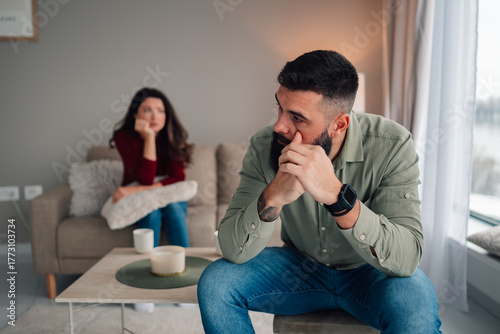 Couple having conflict, feeling sad after argument