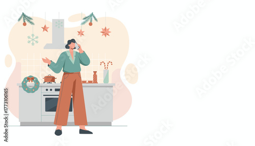 Woman on phone in a Christmas kitchen planning holiday preparations
