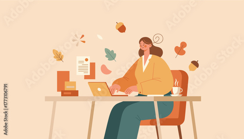 Autumn productivity Happy woman working remotely on laptop with fall leaves and warm coffee