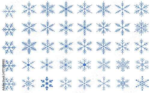 Stunning collection of diverse blue snowflakes elegantly arranged, perfect for festive winter designs and chilling seasonal promotions