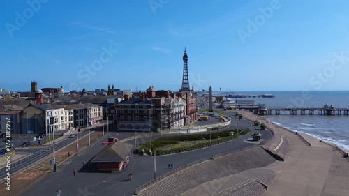 aerial view of Blackpool promenade showing the three piers Blackpool tower and town centre buildings