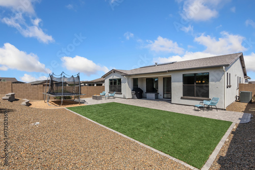 bright and inviting suburban property featuring modern amenities and calm backyard environment