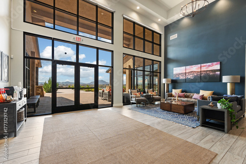 Foto stylish indoor area with natural light, bright clubhouse zone designed for socia