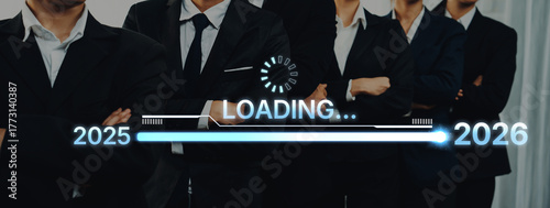 Bilde på lerret Group of business professionals symbolizing readiness and growth with a loading progress bar transitioning from 2025 to 2026 in a corporate setting