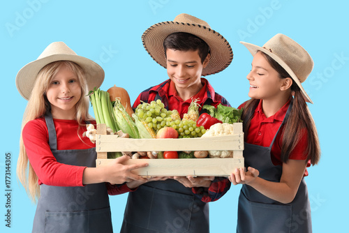 Little farmers with fresh f...
