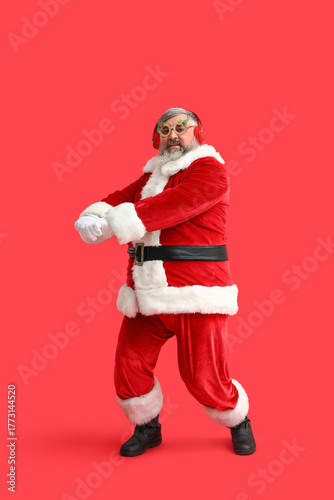 Funny Santa Claus in headph...