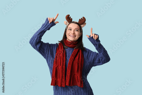 Young woman in warm sweater...