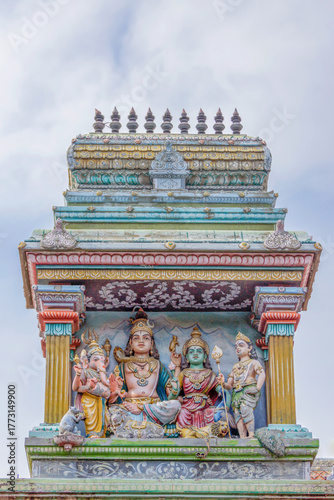 Thiruvannamalai, Tamil Nadu, India - October 9, 2013: Annamalaiyar Temple. Colorful statue combination of Shiva family, he and his wife Parvati with their 2 sons, Ganesha and Murugan