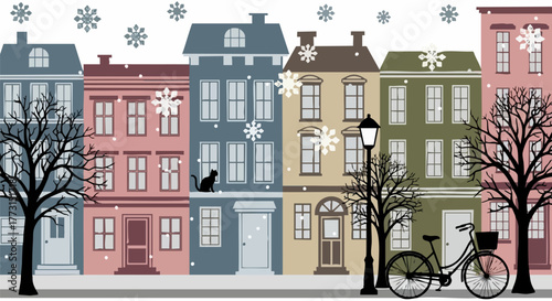 Charming winter street scene with colorful houses and falling snow creating festive mood