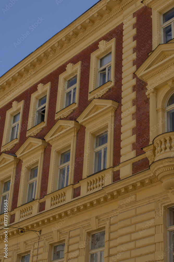 Naklejka premium Sunlit ornate facade with detailed architecture, Heritage restoration scene showcasing intricate design