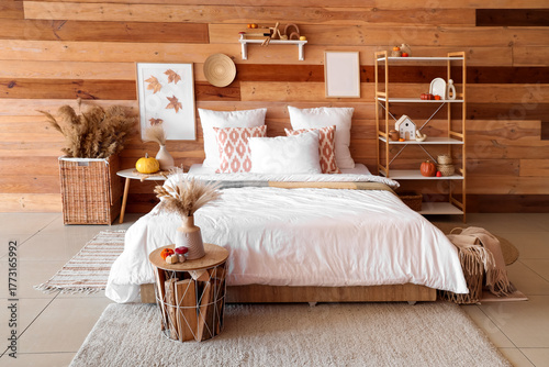 Cozy autumn bedroom interio...