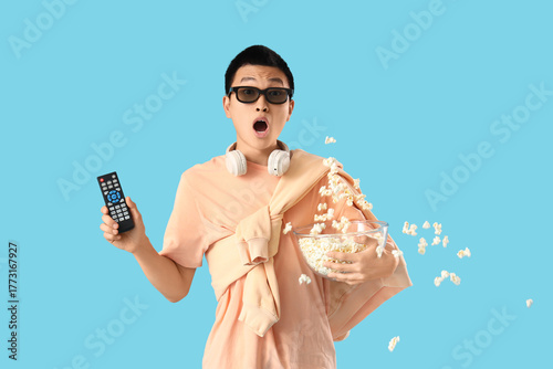 Emotional young Asian man w...