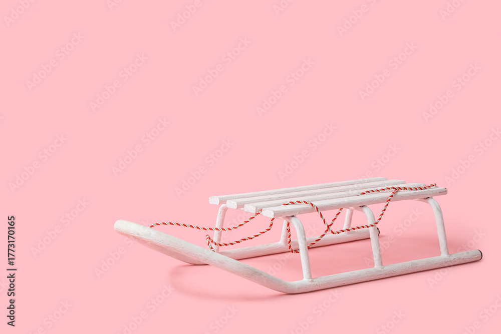 Φωτογραφία Empty sled on pink background