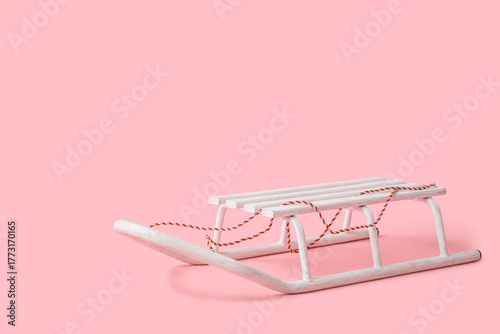 Tablou pe pânză Empty sled on pink background
