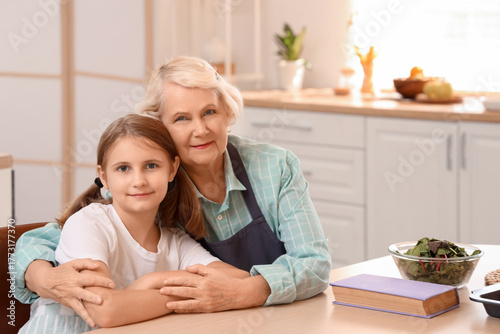 Happy senior woman with rec...