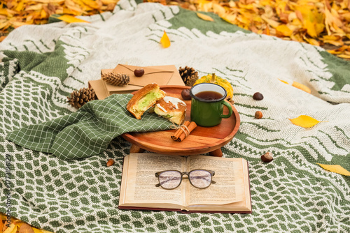 Cup of tea with cake, book ...