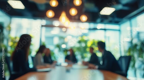 Dynamic team collaborating in modern office space, strategizing for success, professional atmosphere, teamwork and innovation in action, blurred effect