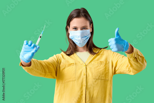 Young woman in medical mask...