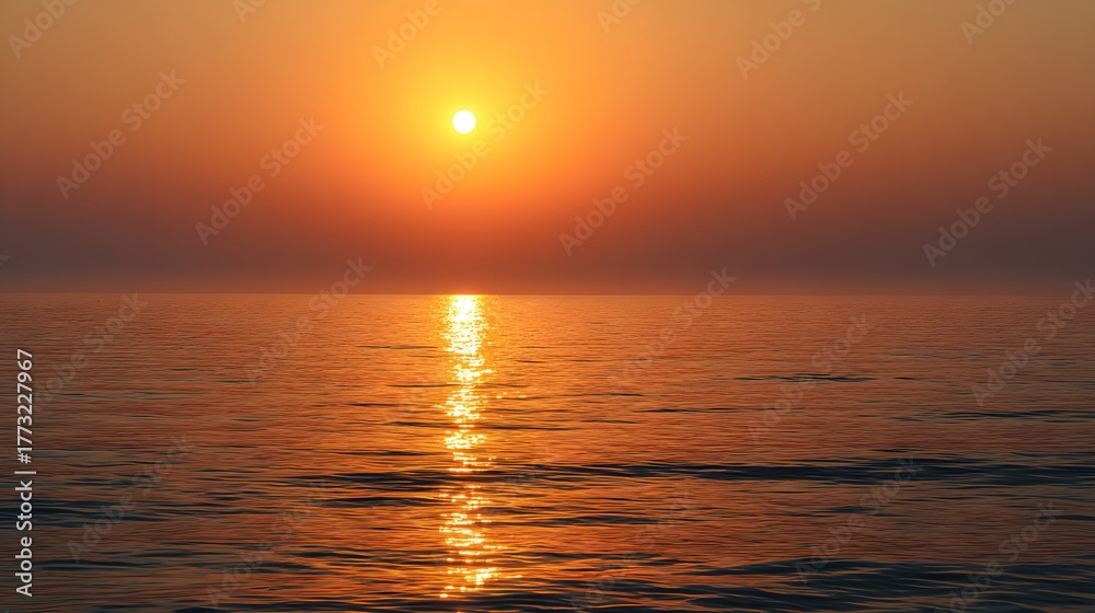 Naklejka premium Brilliant sunlight reflects across the vast ocean surface during a tranquil sunset