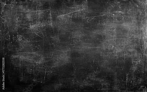 Chalk rubbed out on blackboard, chalkboard texture background. 