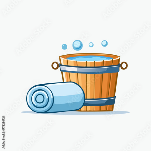 Wooden bucket with water and towel for spa and relaxation.