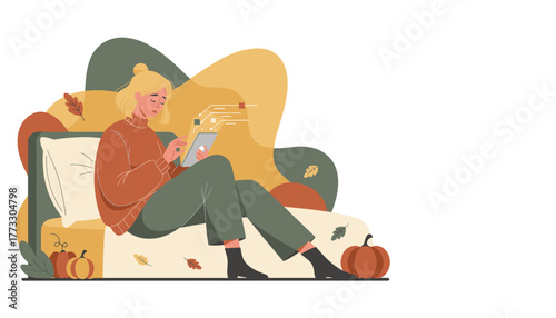 Woman using tablet comfortably at home during autumn focused on remote work or study