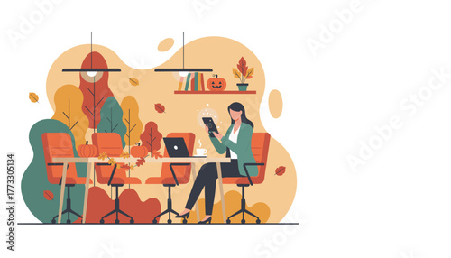 Autumn office meeting Woman works digitally on a tablet with fall decorations and pumpkins