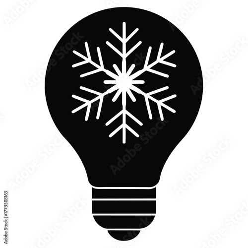 Cold idea concept with lightbulb and snowflake symbol representing winter power saving