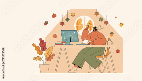 Fall remote work Woman focused on computer in cozy autumnal workspace