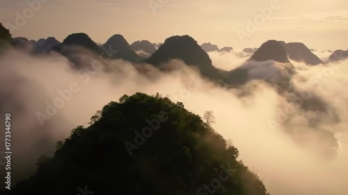 Golden Sunrise Over a Sea of Foggy Mountain Peaks.