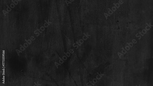 Dark black textured concrete wall background. Dark black grunge textured concrete background