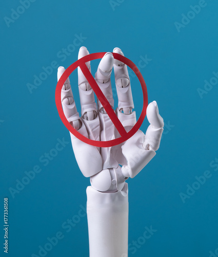 AI Prohibition: Robotic Hand Holding a Red No Sign