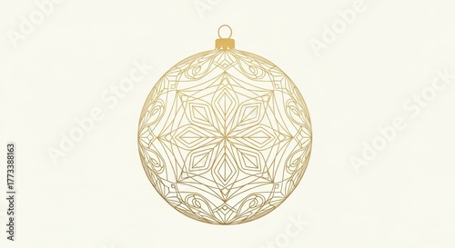 Elegant Golden Christmas Bauble with an Intricate Symmetrical Snowflake Filigree Pattern.