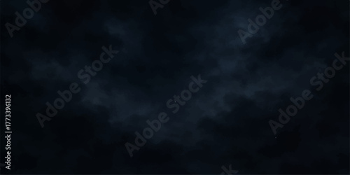 Dramatic light blue smoke on a dark black background creating an abstract texture like a stormy night sky cloud