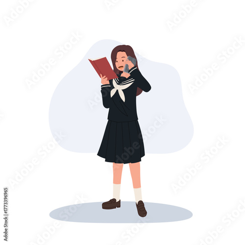 japanese schoolgirl in sailor uniform talking on phone and reading book.