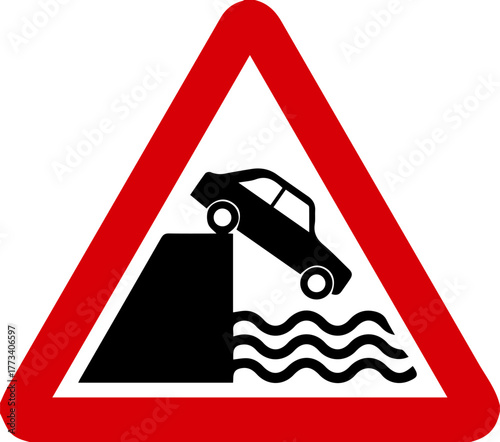 River exit warning signs warn drivers that the road ahead ends at a water_s edge, such as a pier, riverbank, canal, or pond.