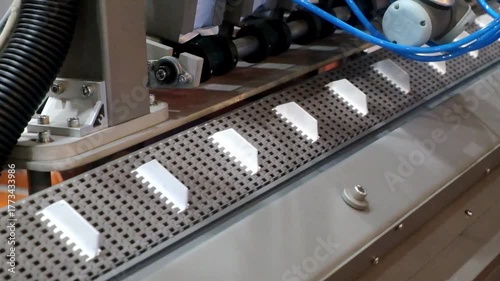 Close up industrial automation conveyor machinery working for manufacturing on smart factory 