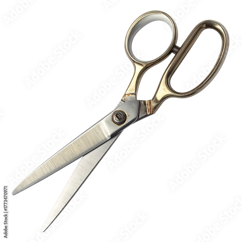 Close-up of open, vintage scissors with gold handles, sharp blades, and silver hinge