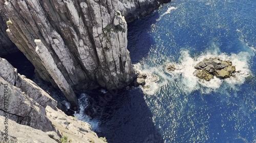 iconic hike at cape hauy with rugged rock formations such as Tombstone with steep cliffs towering above the deep blue sea of the southern ocean, a popular travel destination in Tasmania, Australia.