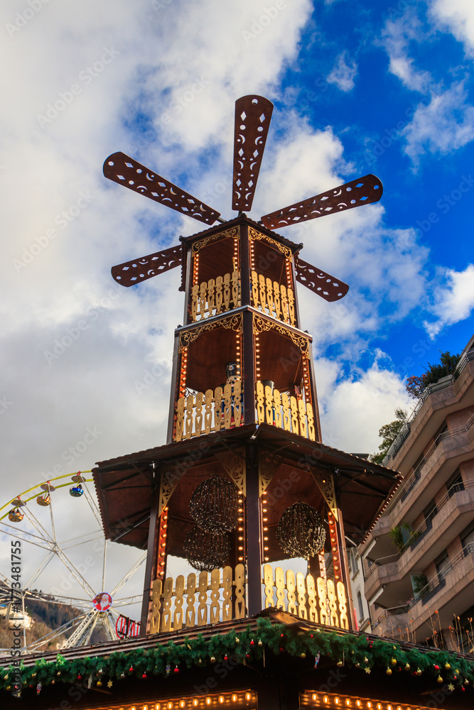 Obraz premium Traditional spinning Christmas pyramid at the Christmas market in Montreux, Switzerland