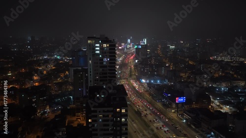 Wallpaper Mural Aerial night view of downtown Lima, Peru. High rise buildings and skyscrapers surrounding a bustling highway with heavy car traffic Torontodigital.ca