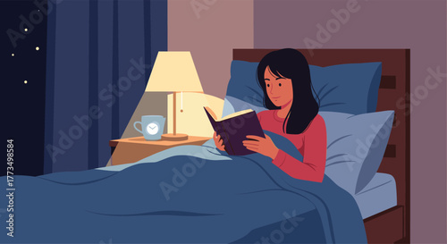 A young woman is comfortably reading a book in her bed at night, illuminated by a warm bedside lamp, with a mug on the nightstand beside her.