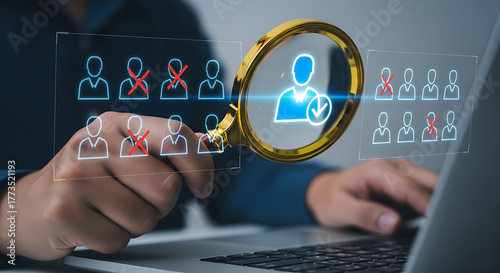 Human resources manager using laptop to choose the best candidate for job