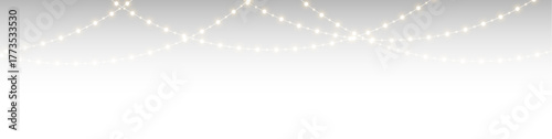 Glowing bokeh light curtain garland overlay creating festive Christmas frame and bright decoration effect.