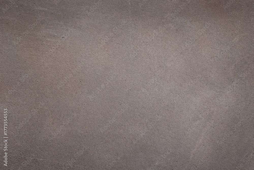 Fototapeta premium Gray concrete wall texture with grunge and weathered surface, ideal as architectural or industrial background for construction, renovation, urban and abstract design projects